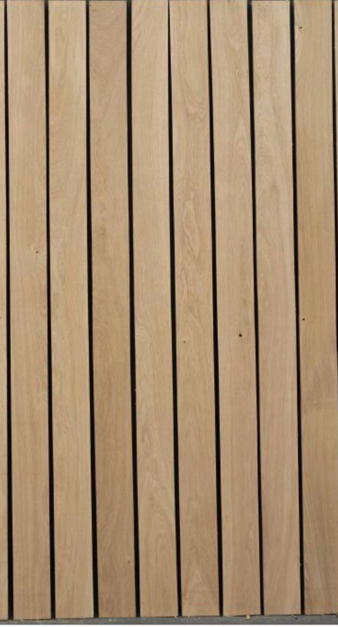 Grade I oak edged boards with clean, even grain
