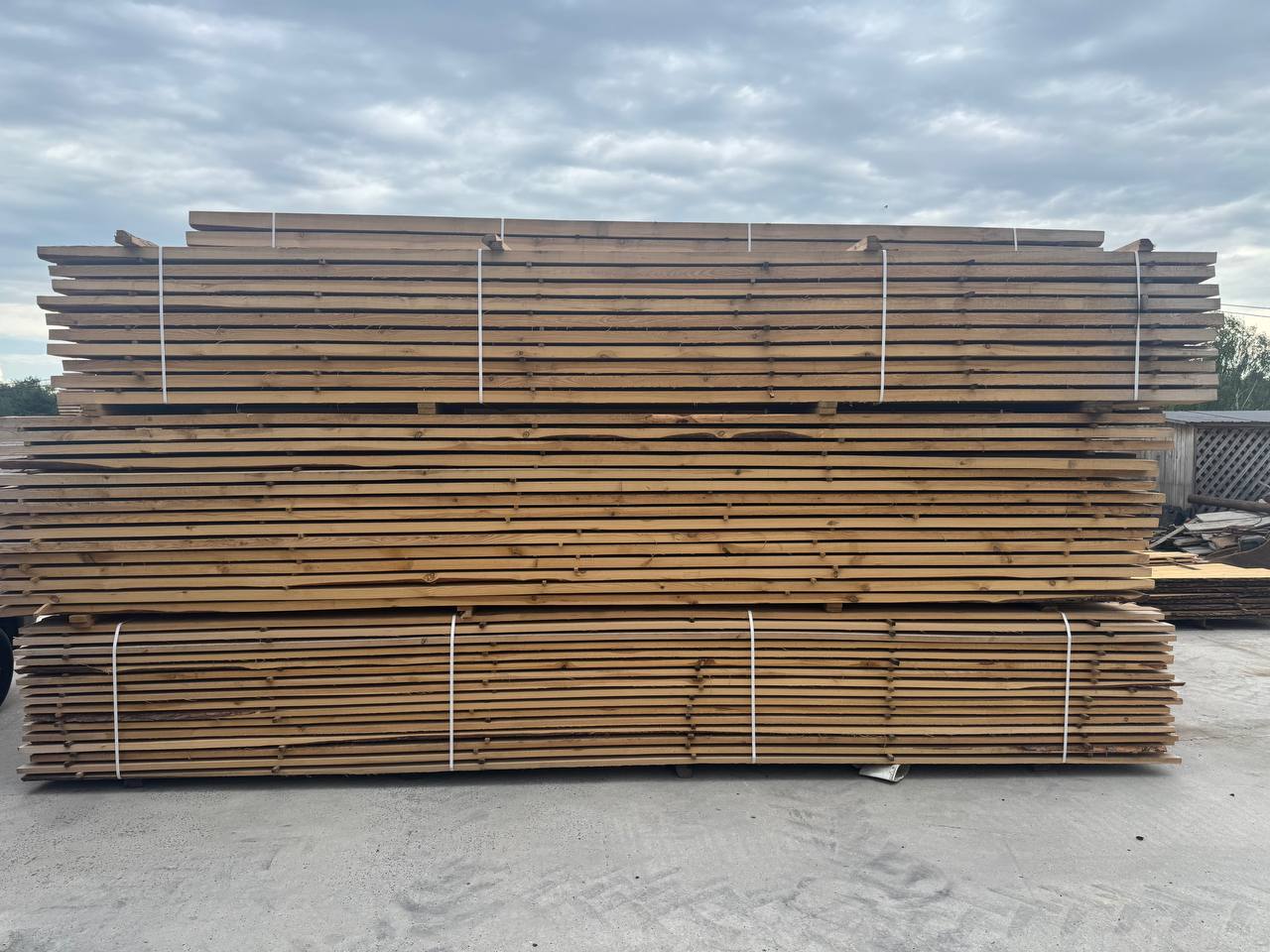 Packs of Ukrainian sawn timber stacked in the export yard